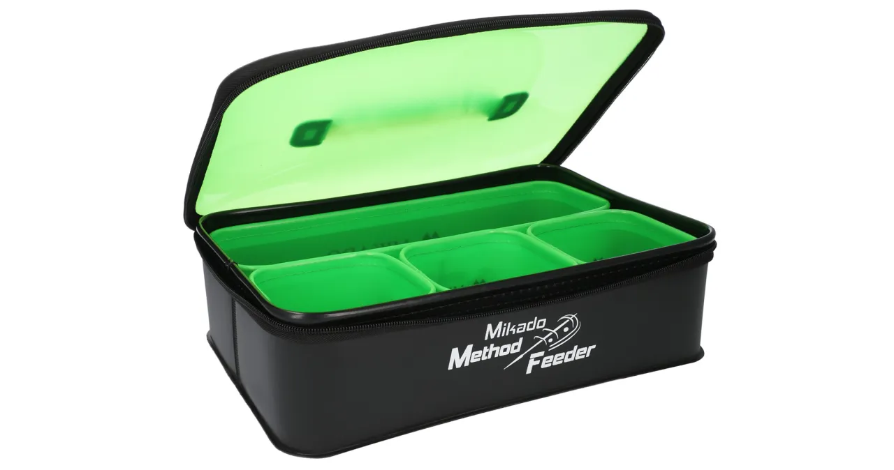 Czarny pojemnik na zanętę z zielonymi przegródkami i neonową klapą. Idealny do przechowywania przynęt na Method Feeder.