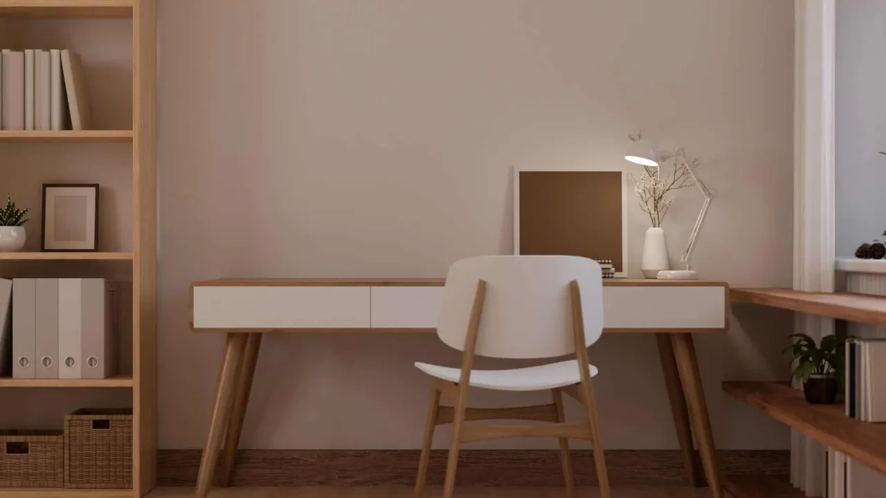 Zorganizowane miejsce do nauki dla dziecka, dziecko skupione na zadaniu w domu