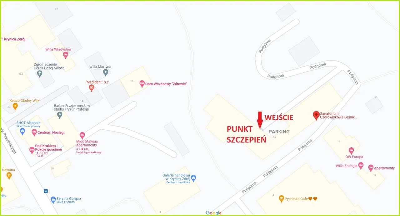 Sanatorium Leśnik w Krynicy-Zdroju, ul. Podgórna 1. Mapa pokazuje punkt szczepień i parking.