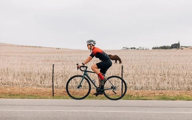 Kobieta na rowerze szosowym w plenerze