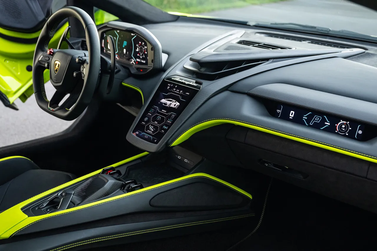 Lamborghini interior cockpit, red ignition button, carbon fiber