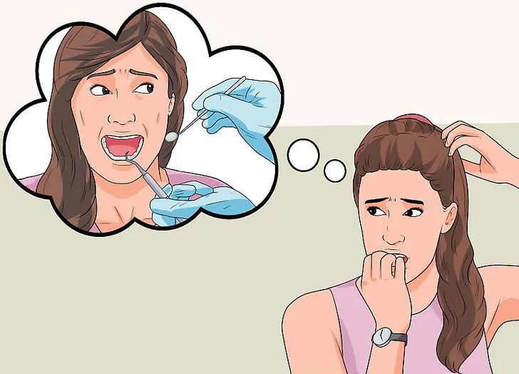 Pacjent rozmawia z dentystą o lęku