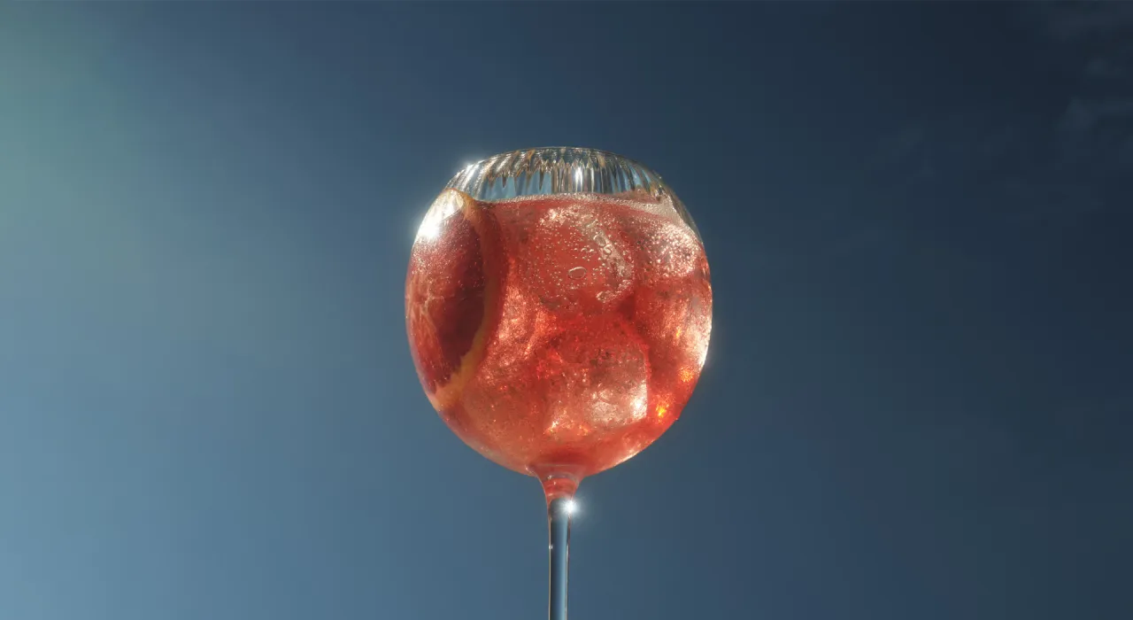 Martini Fiero z tonikiem i pomarańczą w kieliszku typu copa