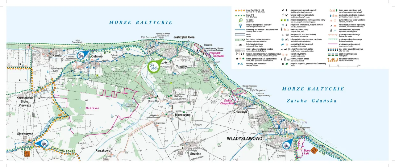 Mapa turystyczna z zaznaczoną trasą rowerową Jastrzębia G&oacute;ra Dębki, prowadzącą przez Karwię, Ostrowo i Władysławowo, wzdłuż Morza Bałtyckiego.
