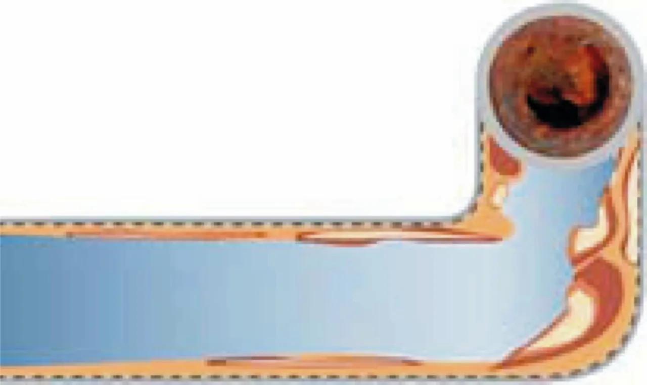 przekr&oacute;j zatkanej rurki chłodnicy osad kamień rdza