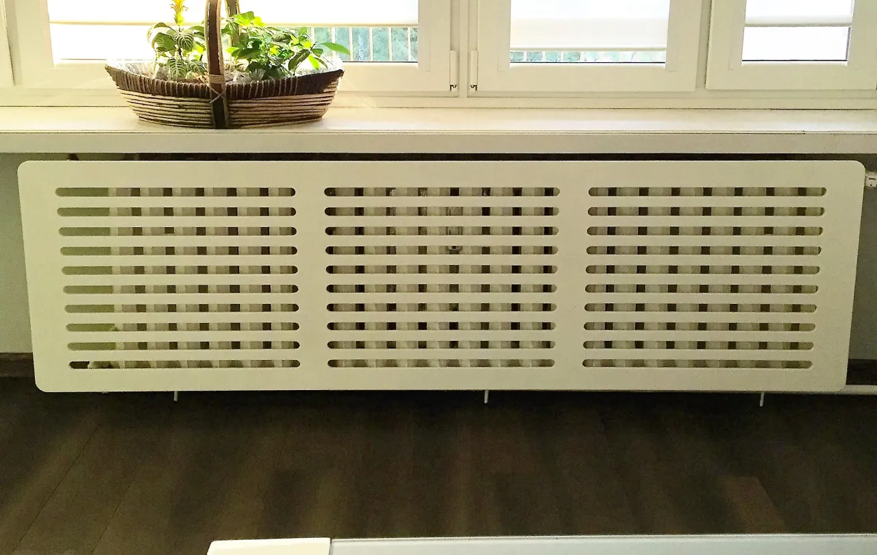 przykłady prawidłowej zabudowy grzejnika żeliwnego z kratkami wentylacyjnymi