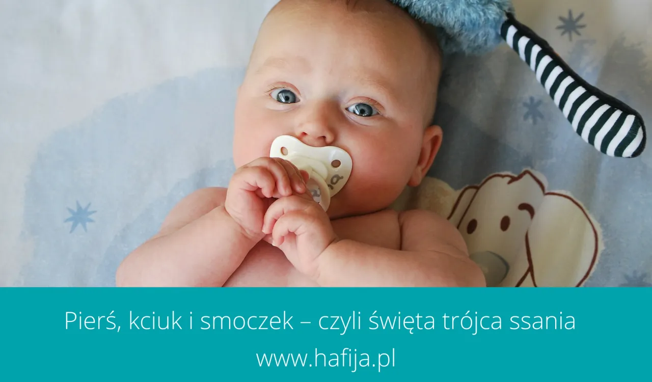 Dziecko karmione piersią i smoczek