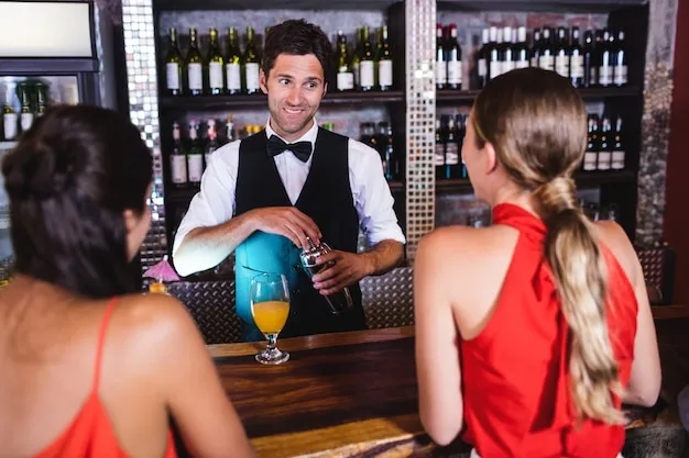 Barman rozmawiający z klientem w barze