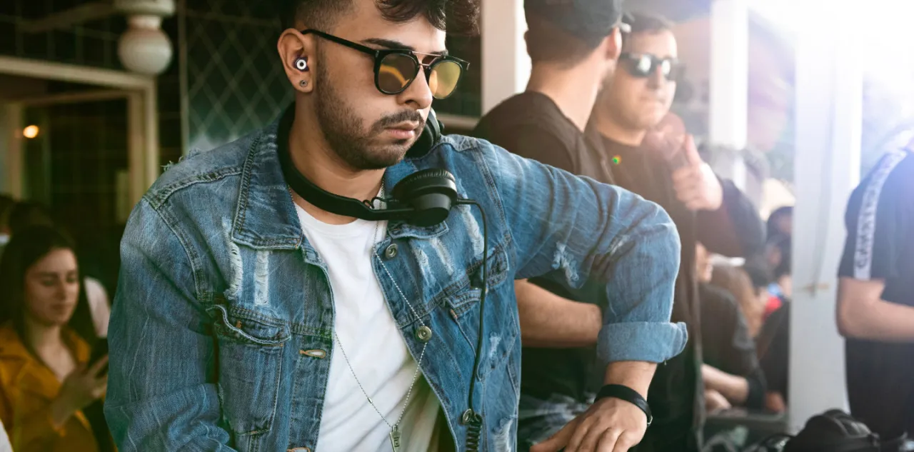 DJ with hearing protection