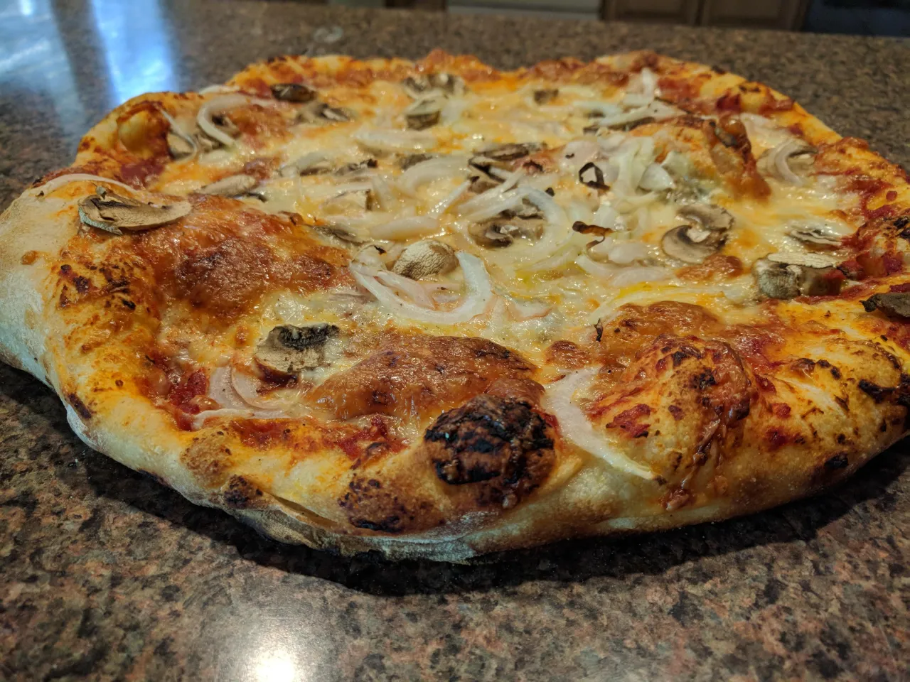 pizza w piekarniku z termometrem