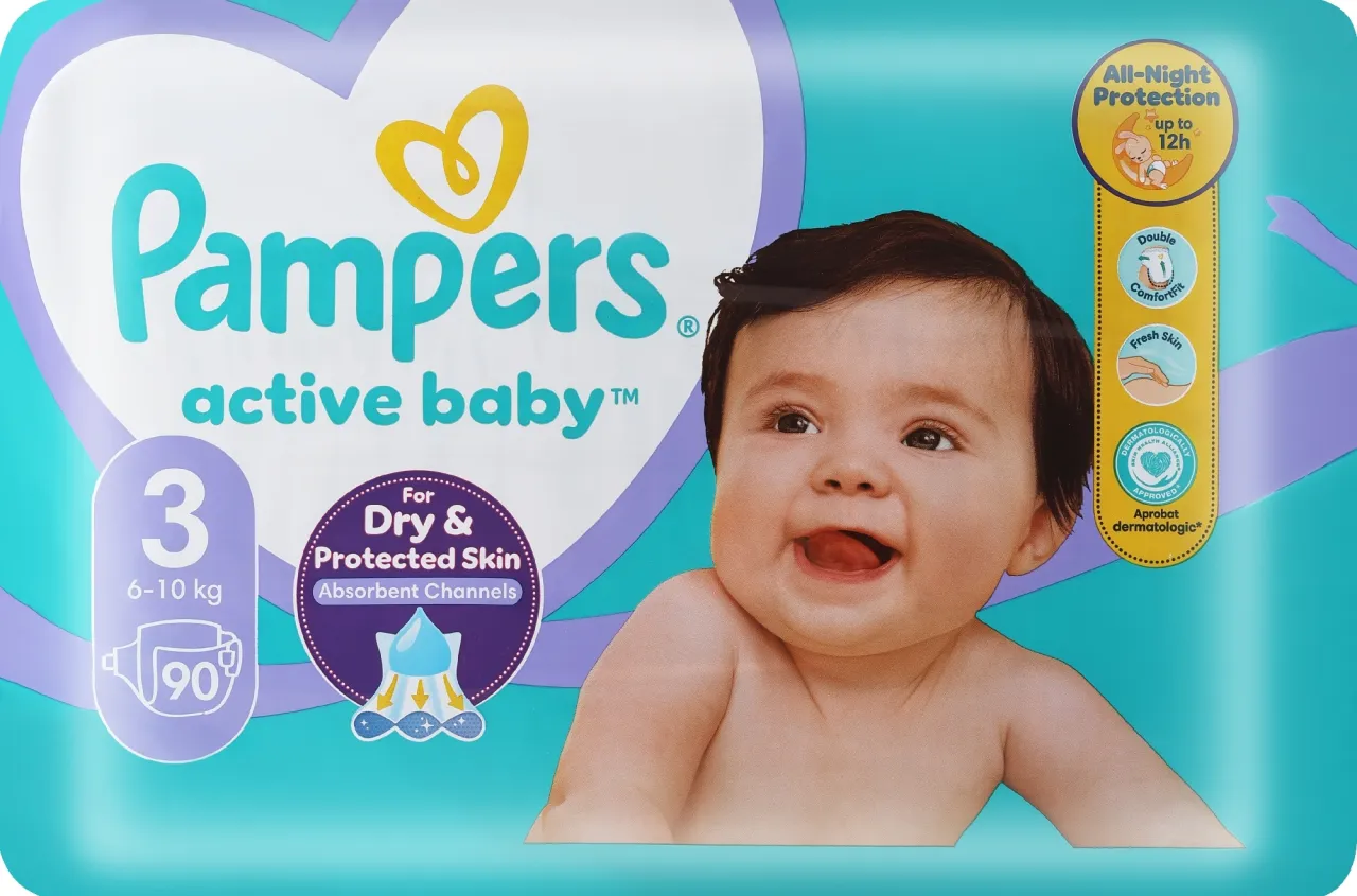 Dziecko w pieluszce Pampers uśmiechnięte