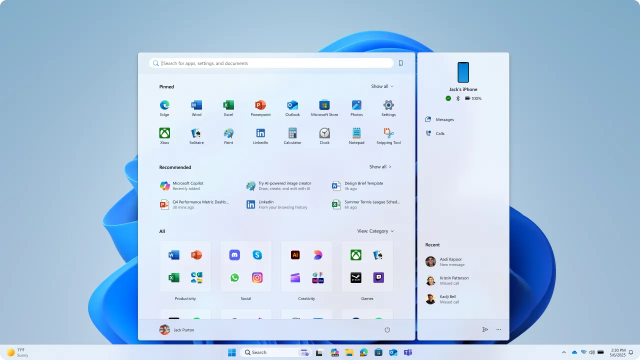 Menu Start w Windows 11 z ikonami aplikacji, w tym Microsoft Copilot, oraz panelem z powiadomieniami z telefonu.