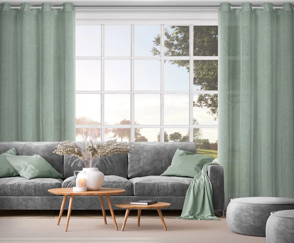 zasłony welurowe do salonu z szarą kanapą