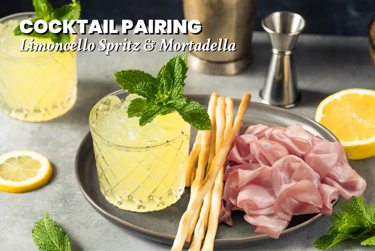 Aperitivo con stuzzichini e cocktail al limoncello
