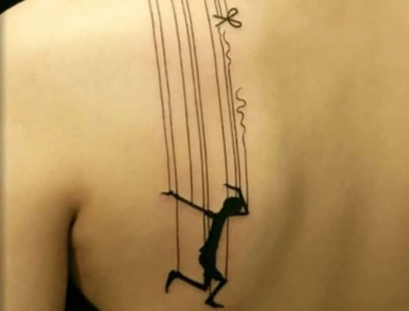 Zdjęcie Tatuaż marionetka znaczenie - odkryj jego symbolikę i interpretacje