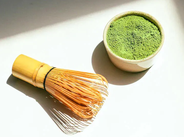 Matcha powder and whisk