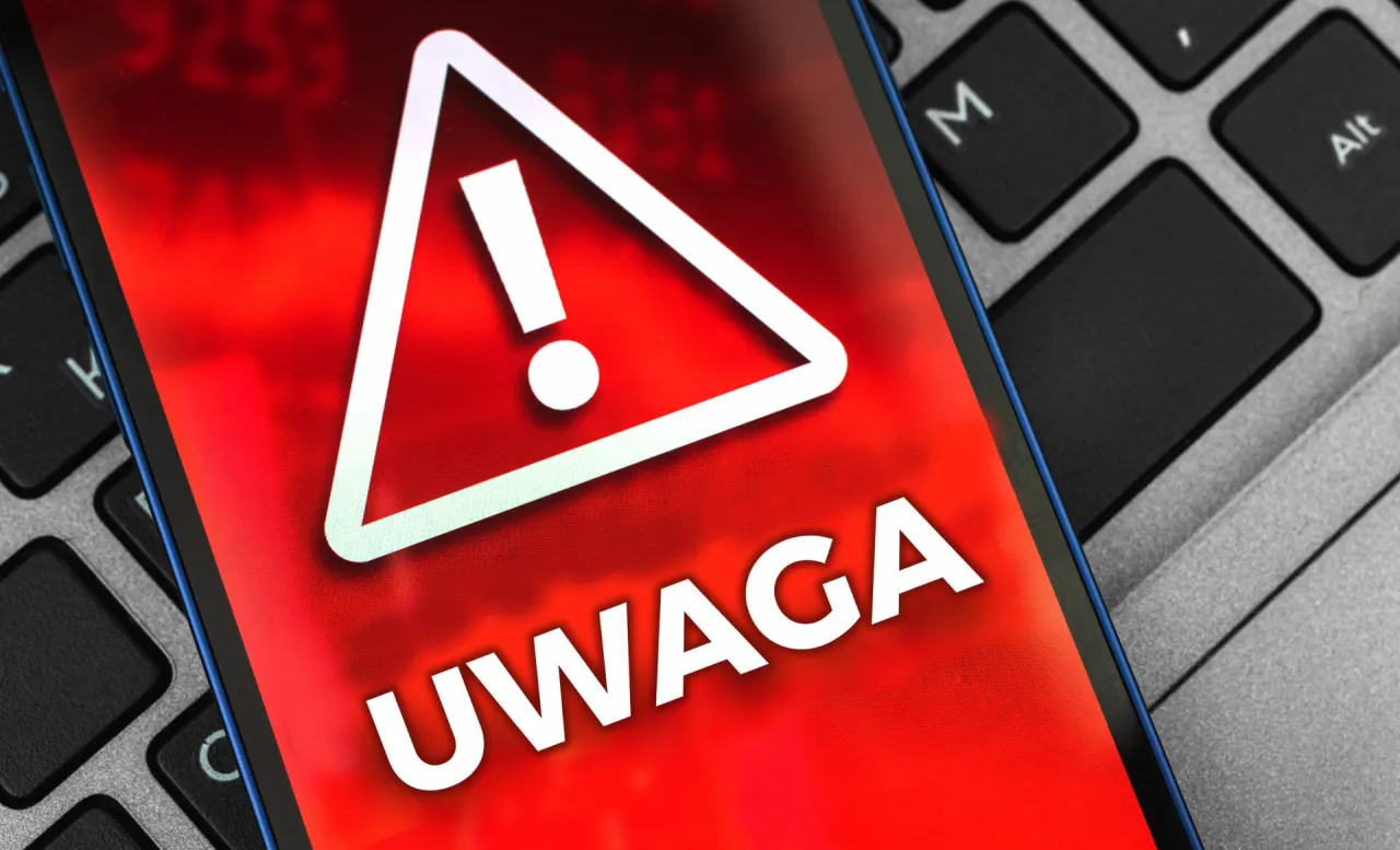 Ostrzeżenie na ekranie telefonu: 