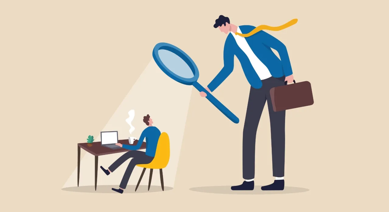 osoba w okularach przeglądająca dokumenty przed komputerem, research dewelopera