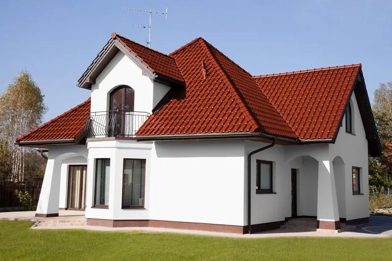Zdjęcie Najlepsze kolory elewacji do ceglastej dachówki - harmonia i styl