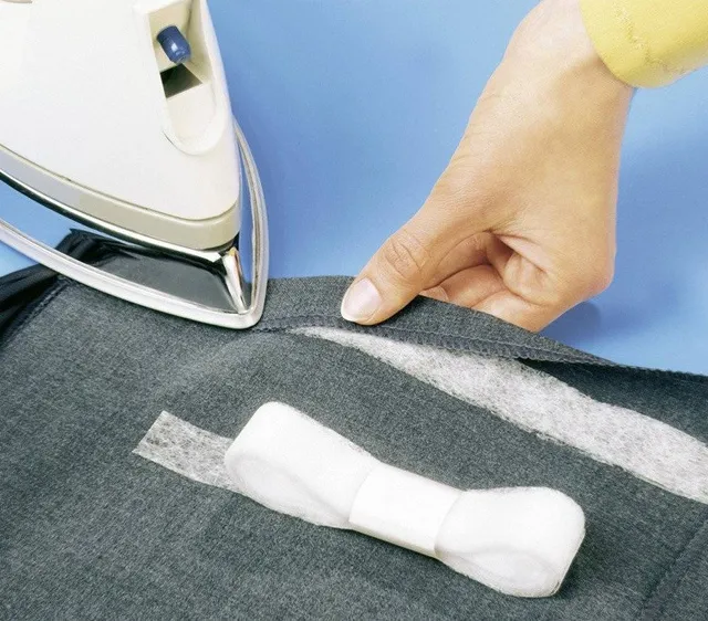 Skracanie bluzy taśmą do tkanin