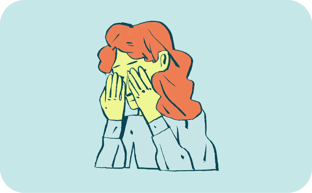 Kobieta z rudymi włosami zakrywa twarz dłońmi, jakby płakała lub była w szoku. Wwo test.