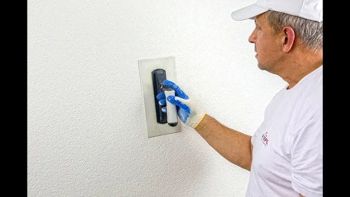 nakładanie gładzi szpachlowej na tynk baranek