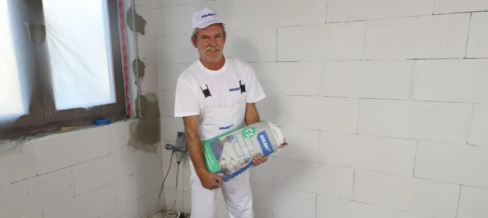 Zdjęcie Jaka zaprawa do tynkownicy - wybierz najlepszą zaprawę do tynkowania