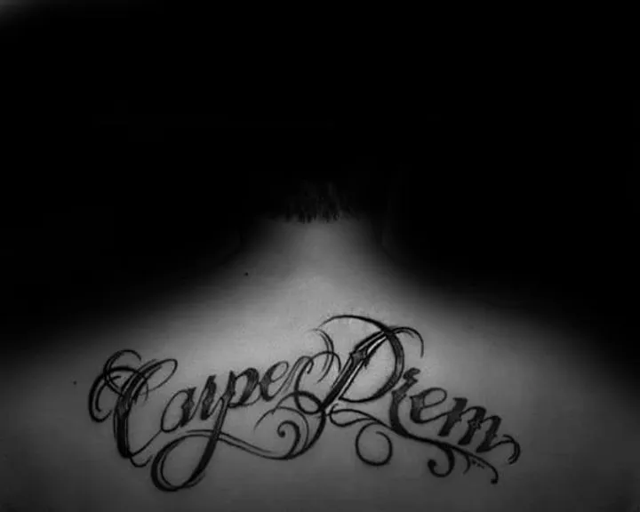 Zdjęcie Tatuaż carpe diem znaczenie: odkryj głębię tego popularnego symbolu