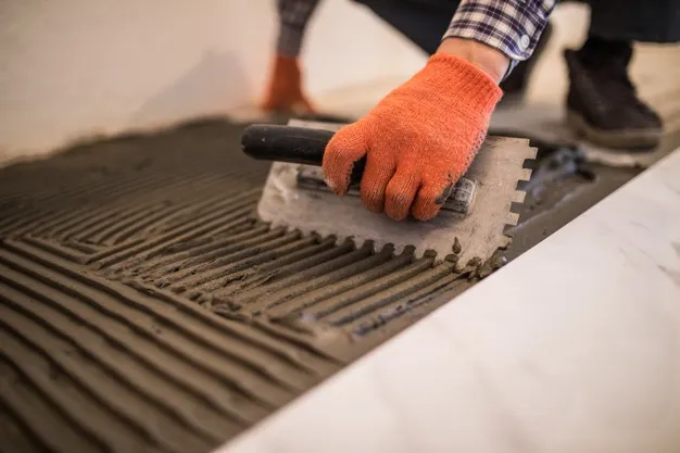 Zdjęcie Ile kleju pod gres 60x60 – uniknij błędów w układaniu płytek