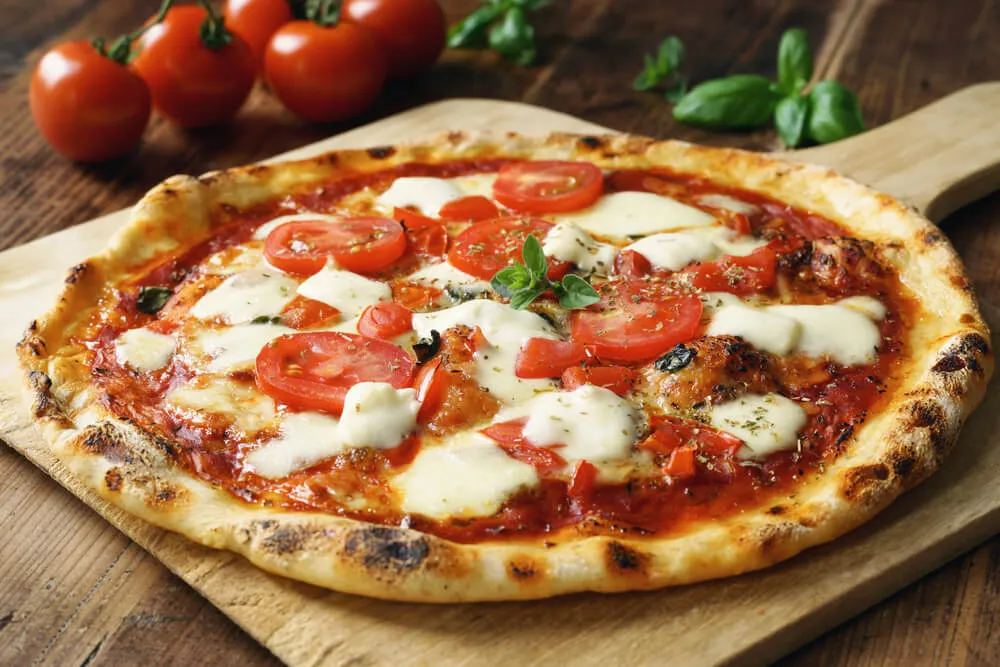 Zdjęcie Z czym pizza? Odkryj najlepsze dodatki, które zachwycą smak