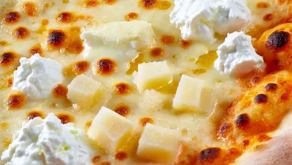 Zdjęcie Jakie sery do pizzy 4 sery? Odkryj najlepsze smaki i połączenia