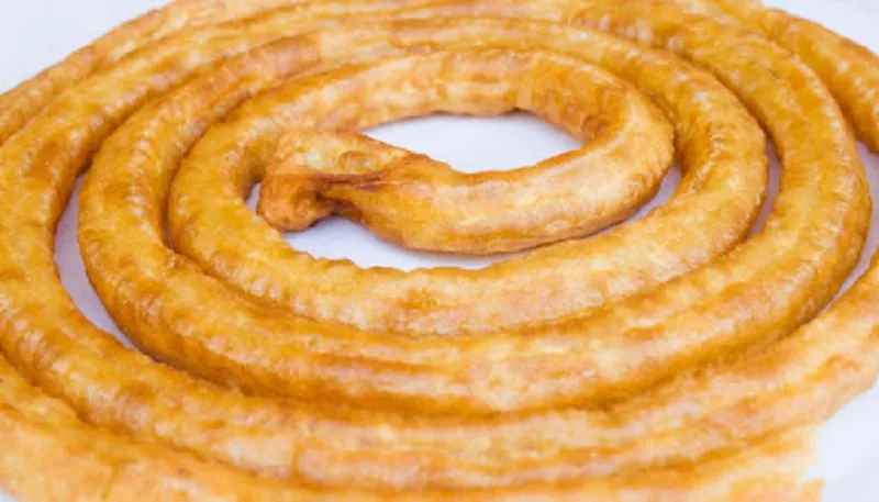 Zdjęcie Receta auténtica de churros madrileños: secretos y tradiciones deliciosas