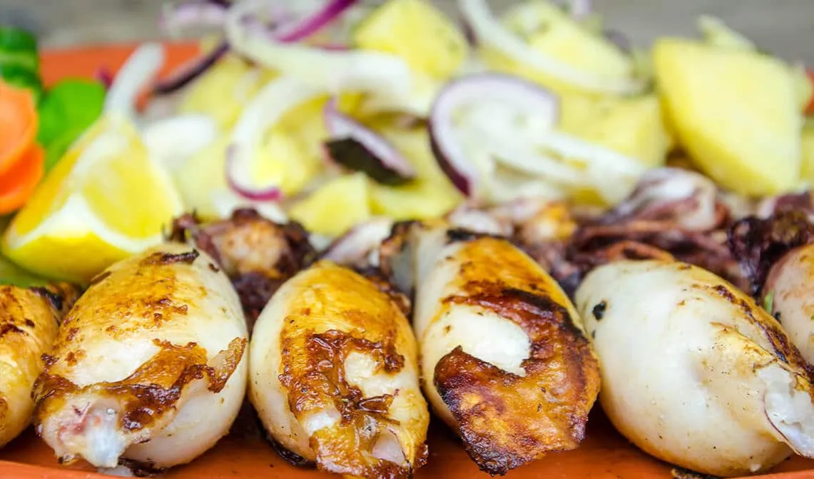 Zdjęcie Receta irresistible de calamares rellenos de gambas que sorprenderán