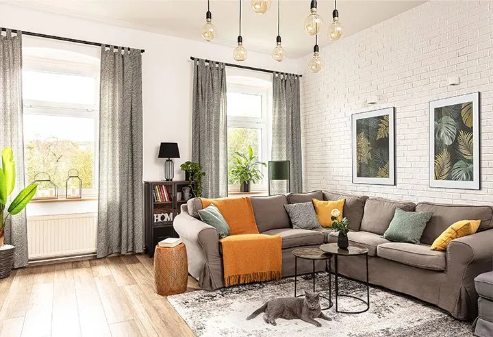 Zdjęcie Jak ocieplić salon dodatkami, aby stworzyć przytulną atmosferę?