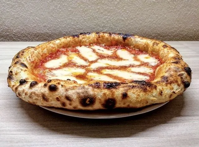 Zdjęcie P&acirc;te &agrave; pizza maison inratable : le secret d'une pizza pro (recettes &amp; astuces)