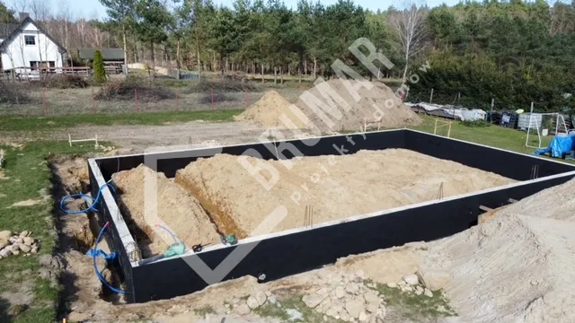Zdjęcie Jak obliczyć ilość dysperbitu potrzebną do hydroizolacji fundamentów? Praktyczny poradnik krok po kroku