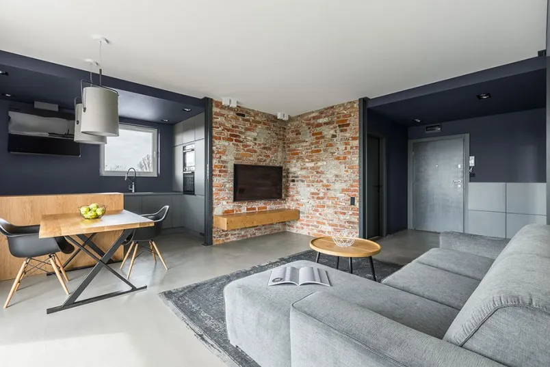 inspiracje słup w salonie lamele beton cegła