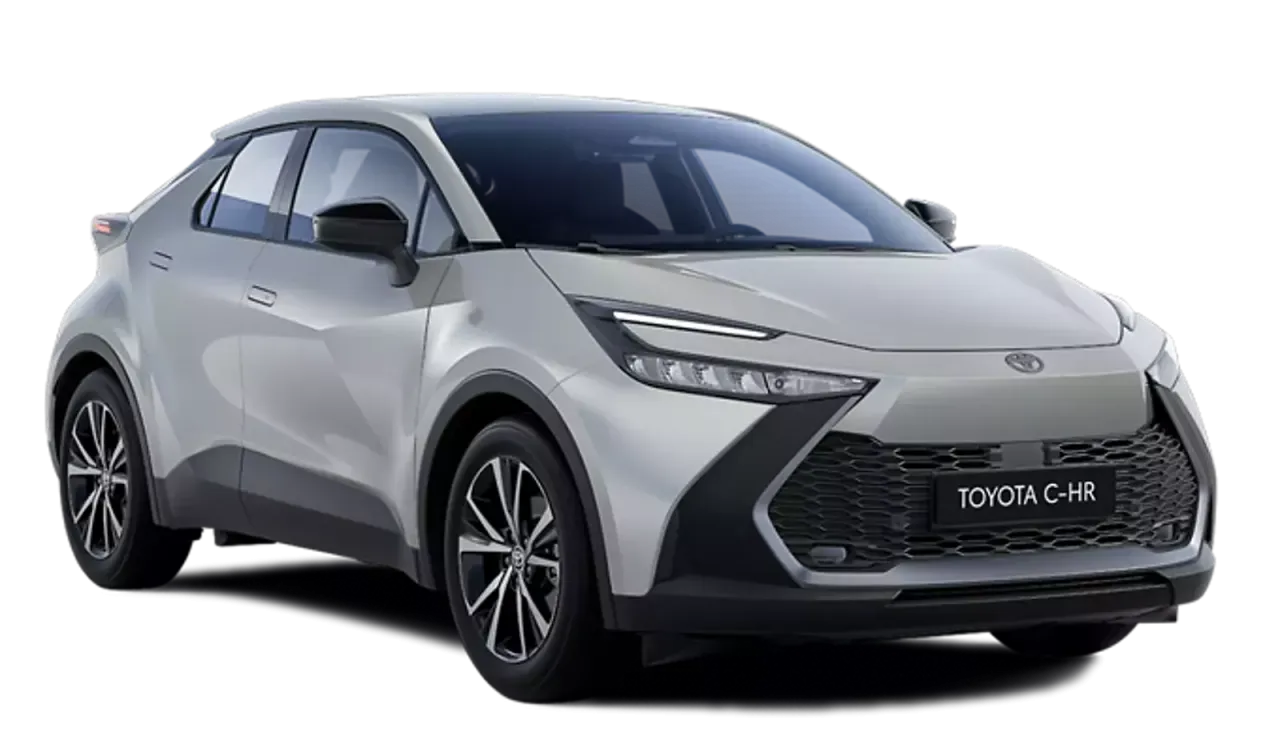 Nowoczesna Toyota C-HR w kolorze srebrnym. Zastanawiasz się, ile kosztuje Toyota hybryda? Ten model to świetny wyb&oacute;r.