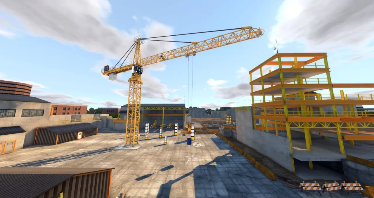 Ż&oacute;łty dźwig budowlany na placu budowy, obok powstającego budynku z ż&oacute;łtą konstrukcją.