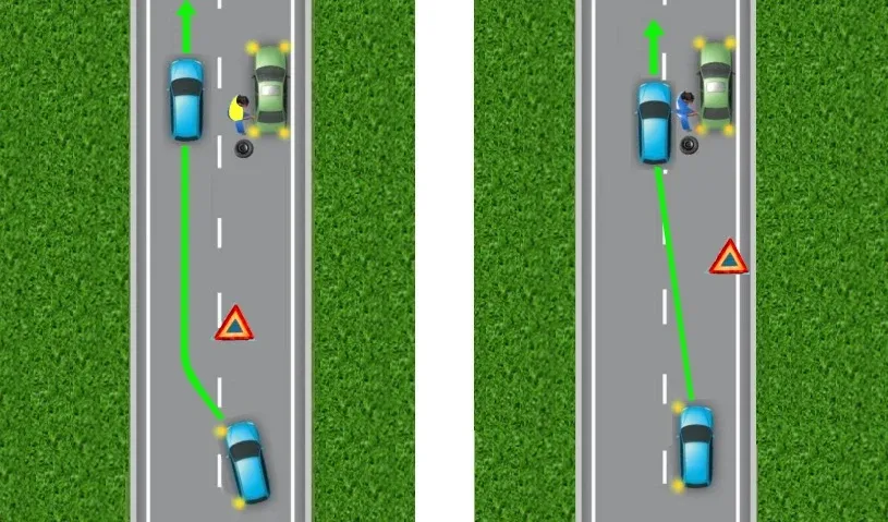 prawidłowe umieszczenie tr&oacute;jkąta ostrzegawczego na holowanym samochodzie