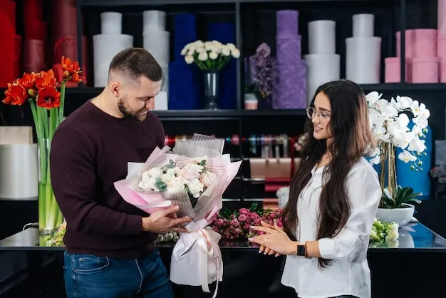 mężczyzna kupujący kwiaty w kwiaciarni