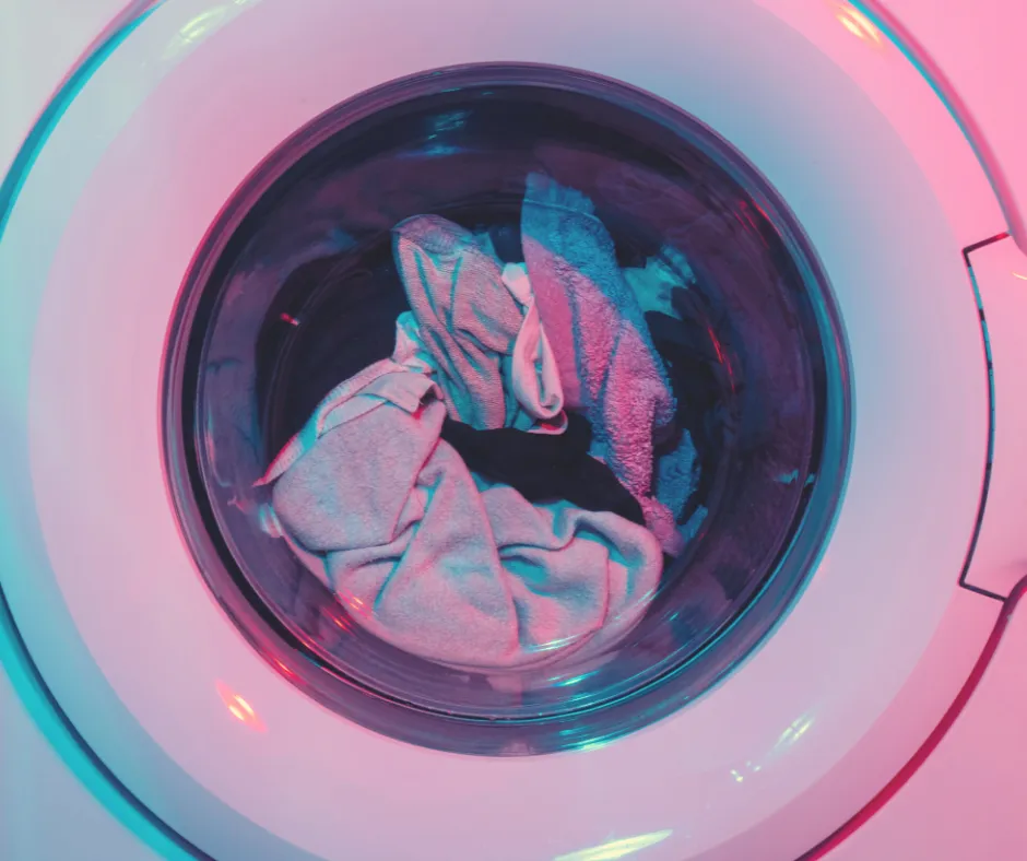 przeładowany bęben pralki