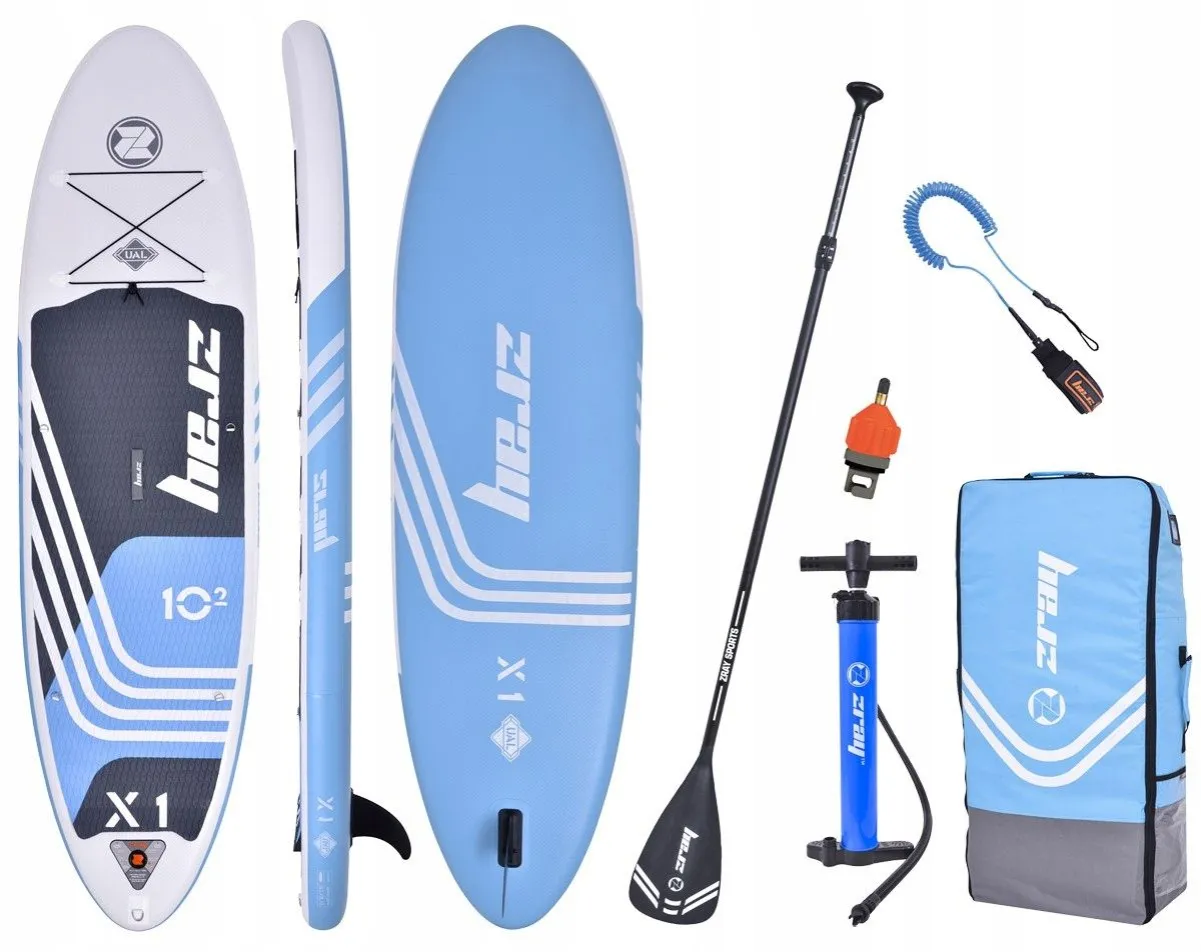 Transport pompowanej deski SUP i kajaka na dachu samochodu