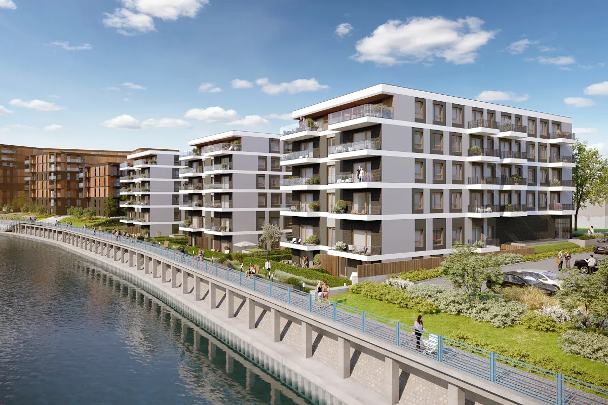 Nowoczesny apartamentowiec we Wrocławiu obok starej kamienicy