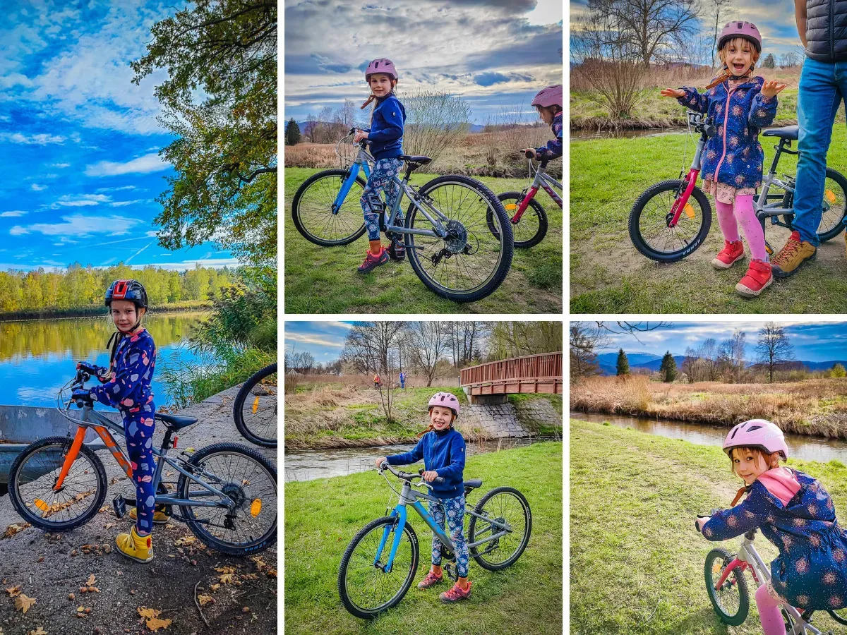 Dzieci cieszą się jazdą na rowerach. Wesołe miny i kaski świadczą o bezpiecznych trasach rowerowych dla dzieci.