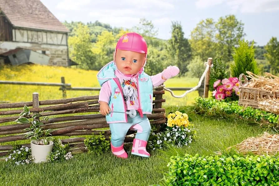 dziecko mierzące strój jeździecki w sklepie