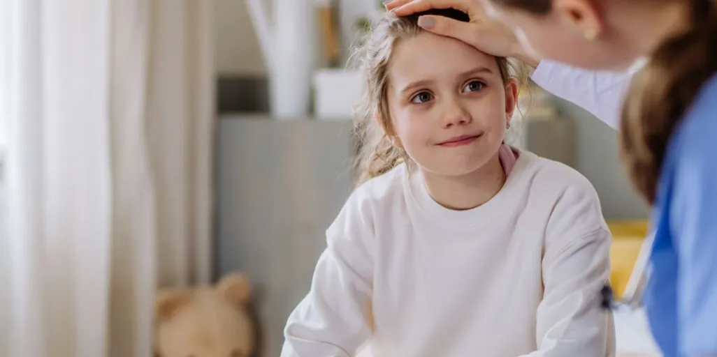 pediatra konsultacja rodzice dziecko refluks