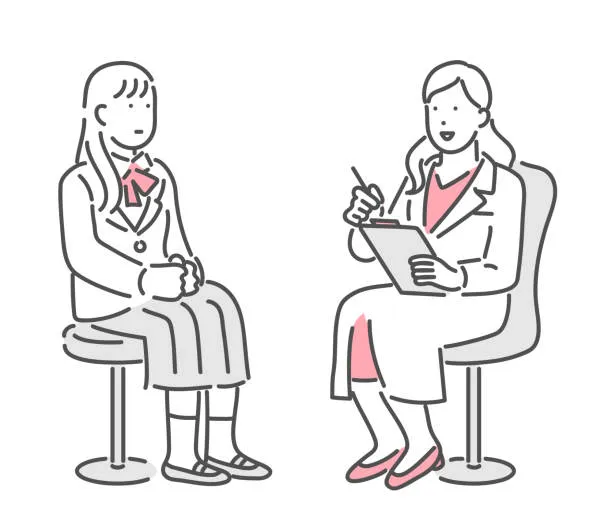 Szkolny doradca zawodowy rozmawia z uczniem