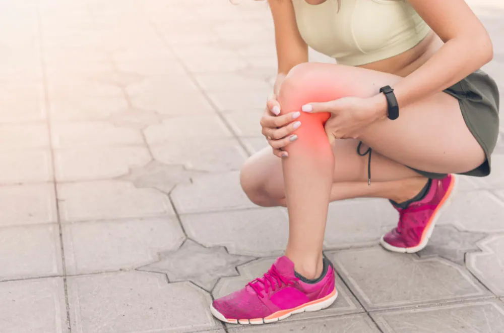 biegacz z kontuzją kolana