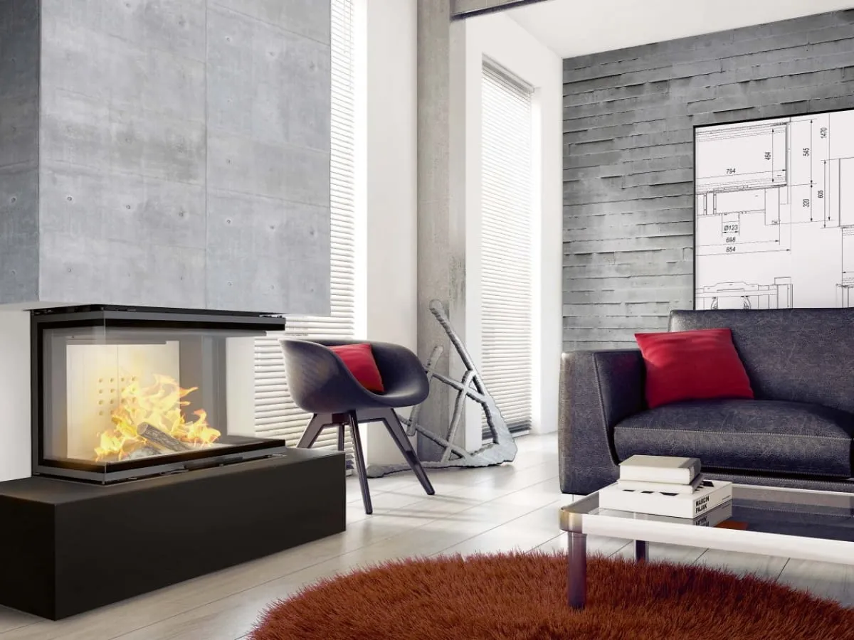 Nowoczesna obudowa do kominka z widocznym ogniem, w minimalistycznym salonie z betonowymi ścianami i wygodną kanapą.